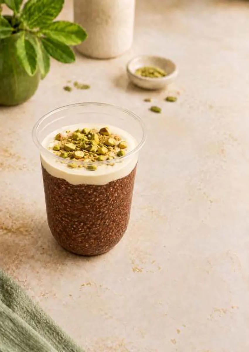 Chocolate Supangle chia pudding topped with yoghurt and pistachio