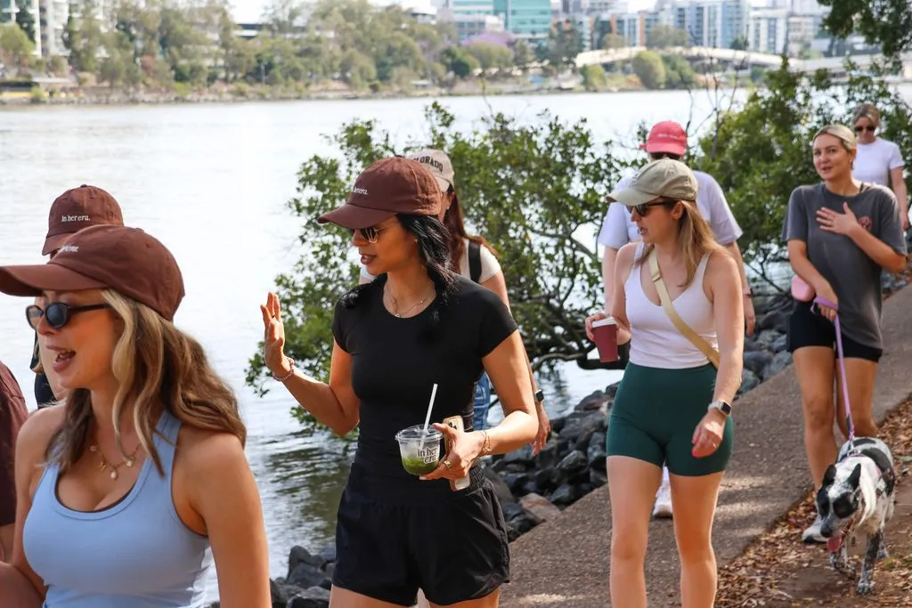 In Her Era community walk along the Brisbane river